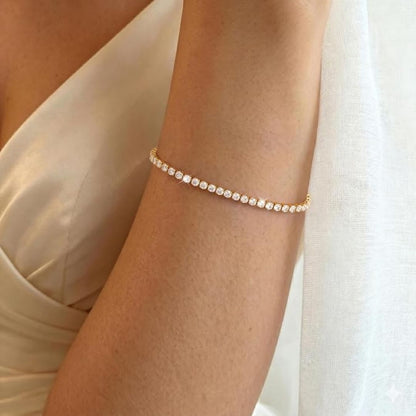 Sofia – Elegant tennisarmband i guld med gnistrande zirkoner